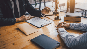 Man meeting with a tax attorney for IRS debt relief options