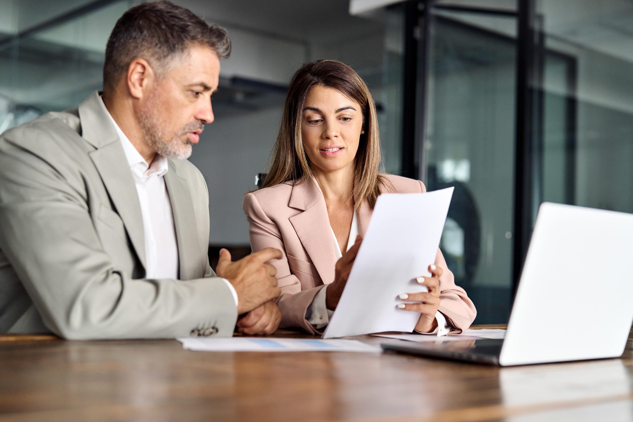Tax relief advisor explains IRS forgiveness application to a concerned client.
