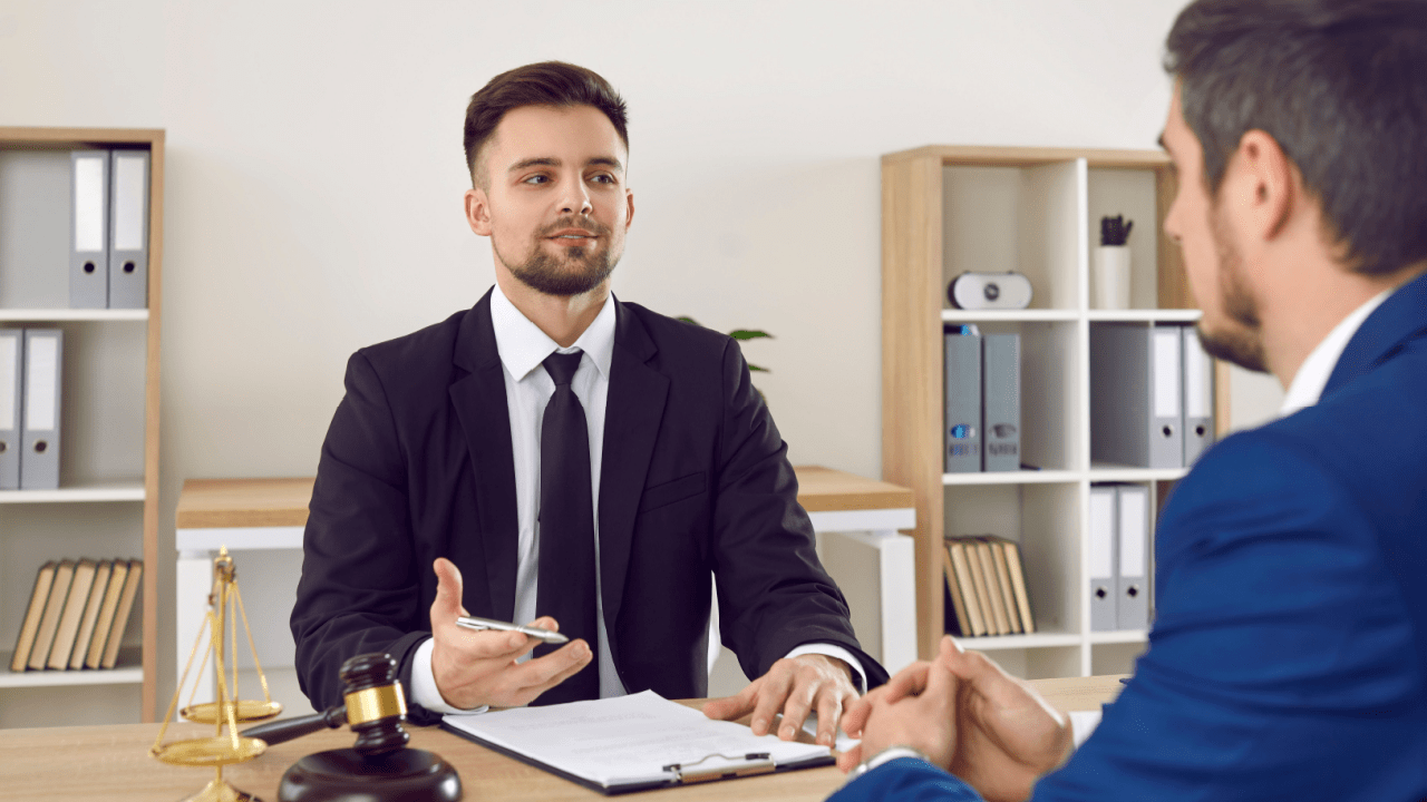 Tax attorney consulting client about tax 709 gift tax forms and legal compliance requirements