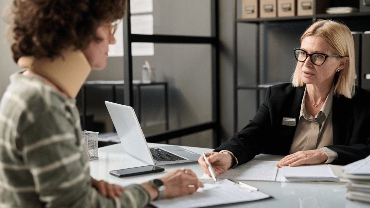 Tax professional consulting a client about who qualifies for tax debt relief programs and eligibility requirements