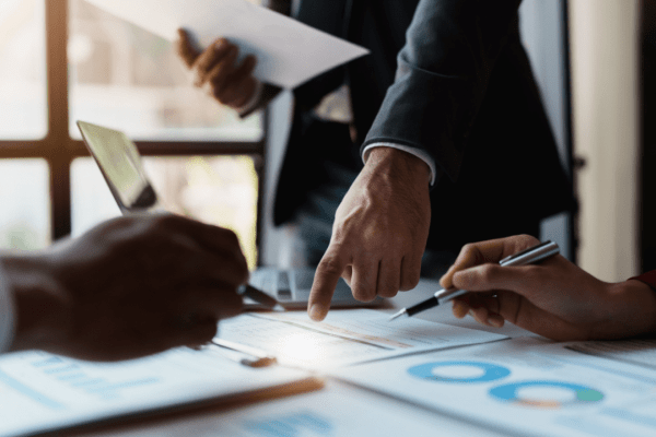 Tax professional consulting with client on how can I get my tax debt forgiven through various IRS relief programs