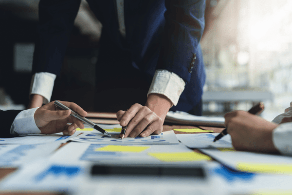 Tax professionals reviewing eligibility criteria to determine who qualifies for the IRS fresh start program
