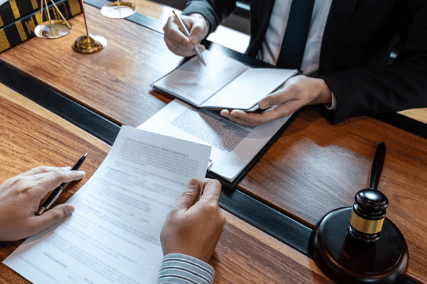 Tax attorney negotiating with IRS official showing can a tax attorney negotiate with the IRS in legal meeting