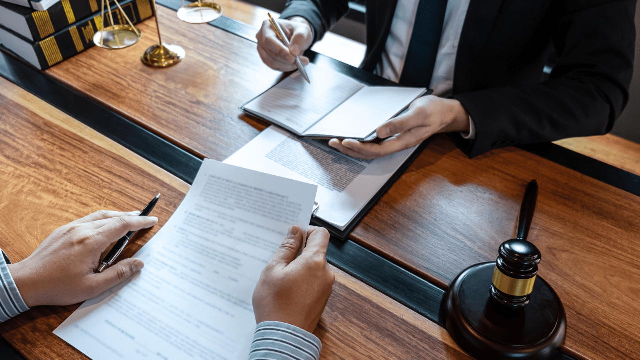 Tax attorney negotiating with IRS official showing can a tax attorney negotiate with the IRS in legal meeting