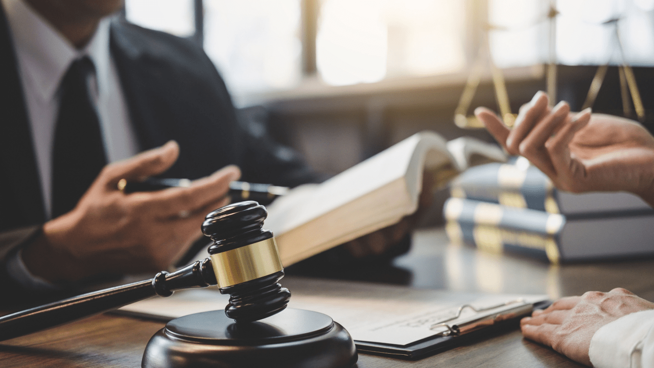 Tax attorney consultation showing how much does a tax lawyer cost in the US with legal documents and gavel