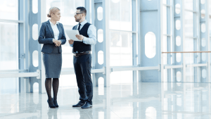 Professional consultation discussing cost of hiring a tax debt lawyer in modern office setting