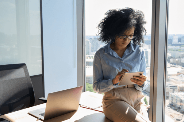 Professional tax lawyer in office discussing retainer fees - how much is a retainer for a tax lawyer