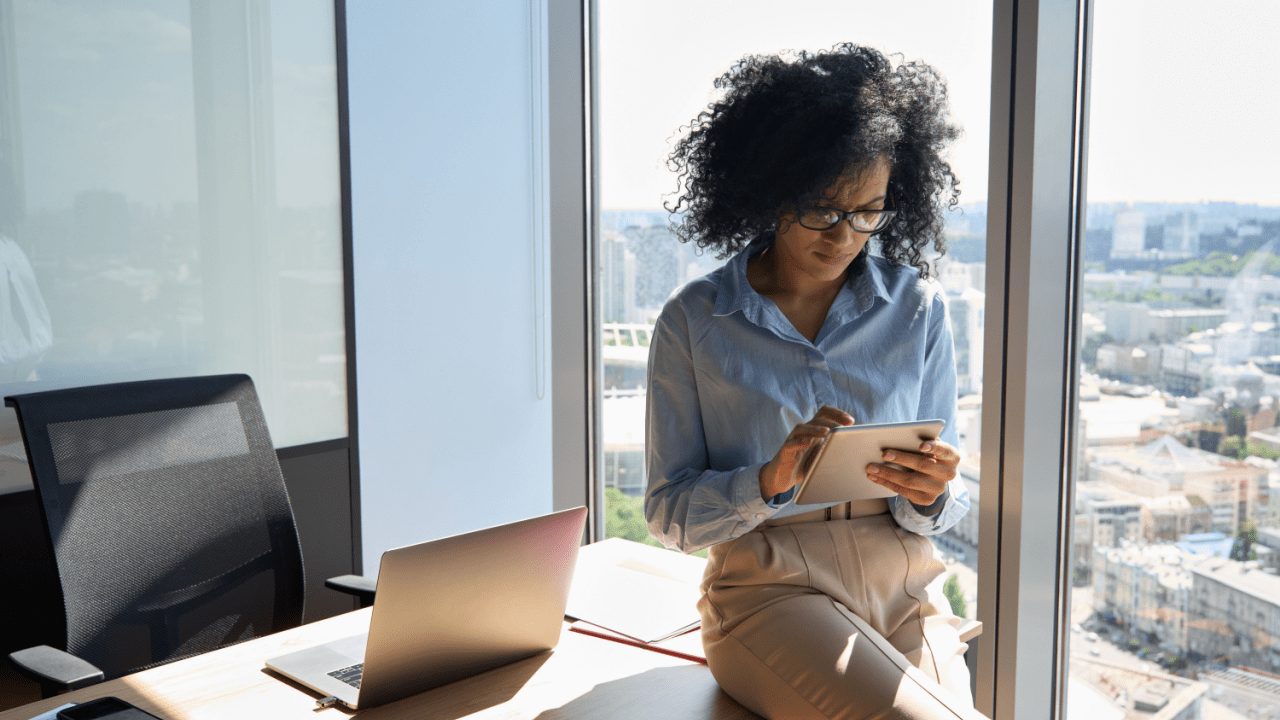 Professional tax lawyer in office discussing retainer fees - how much is a retainer for a tax lawyer