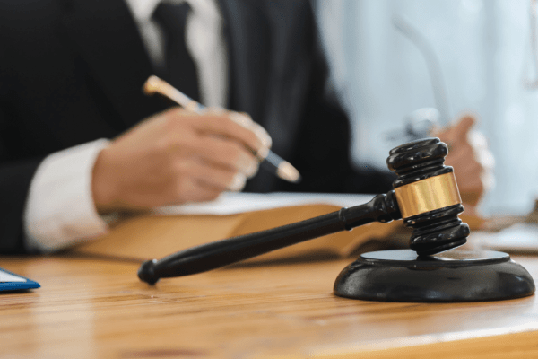 Professional tax attorney workspace showing gavel and legal documents - what does a tax attorney do in their daily practice