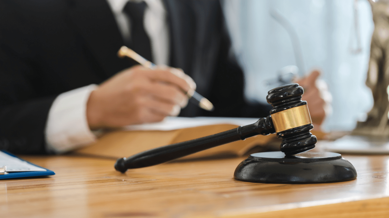 Professional tax attorney workspace showing gavel and legal documents - what does a tax attorney do in their daily practice