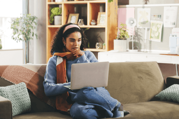 nderstanding What Qualifies for Innocent Spouse Relief - Woman Reviewing Tax Information Woman researching what qualifies for innocent spouse relief on laptop at home