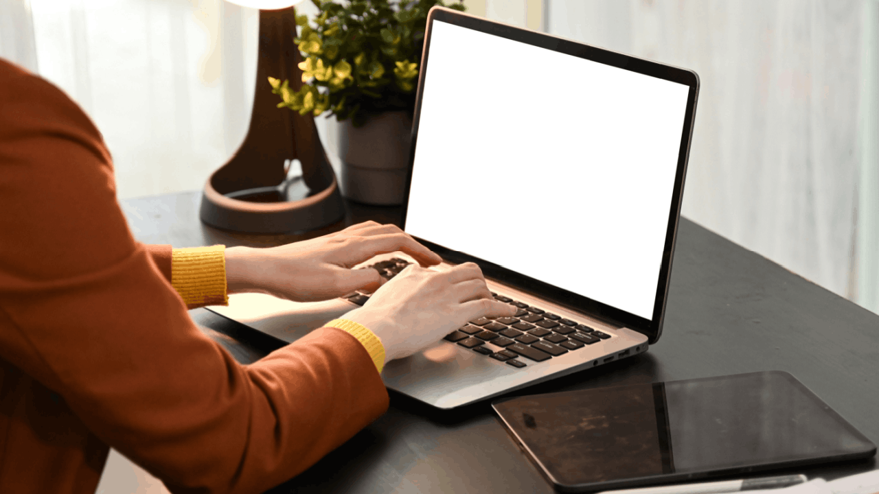 Person researching what's the difference between injured spouse relief and innocent spouse relief on laptop