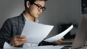 Taxpayer reviewing documents to understand what is the IRS 10 year rule for tax debt relief