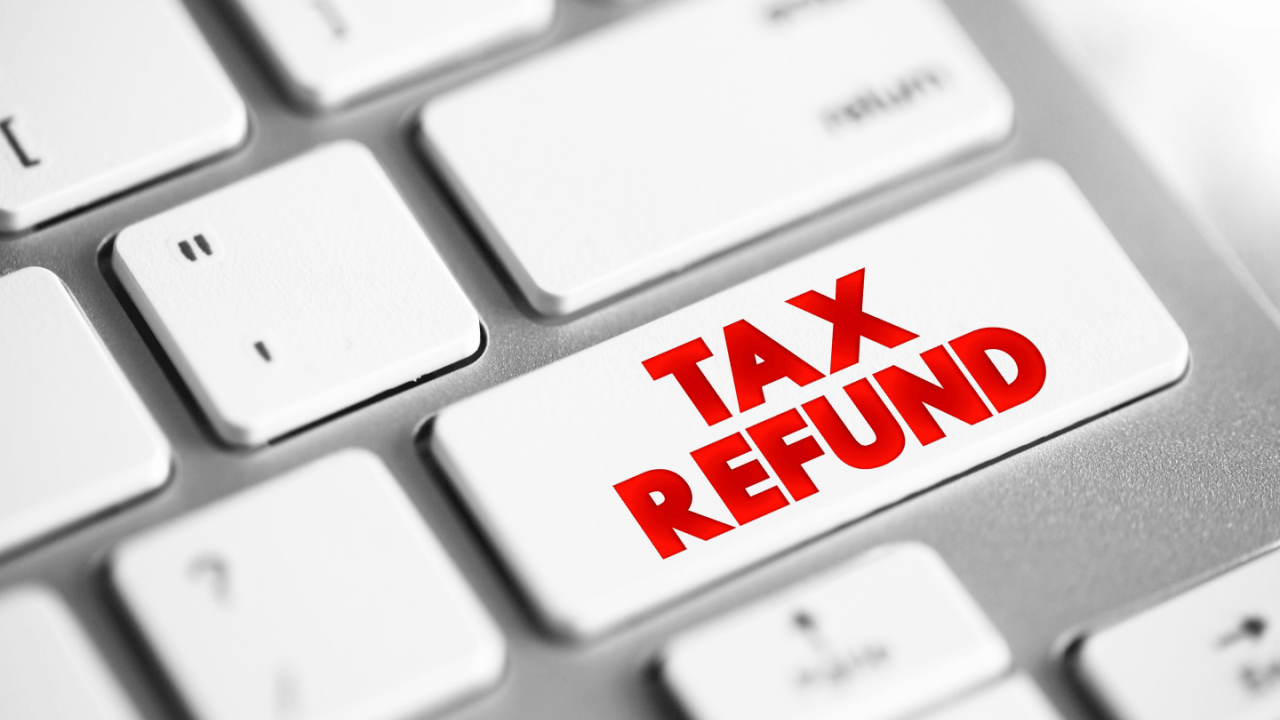 Keyboard key showing "TAX REFUND" in red text representing IRS refund garnishment protection and prevention strategies