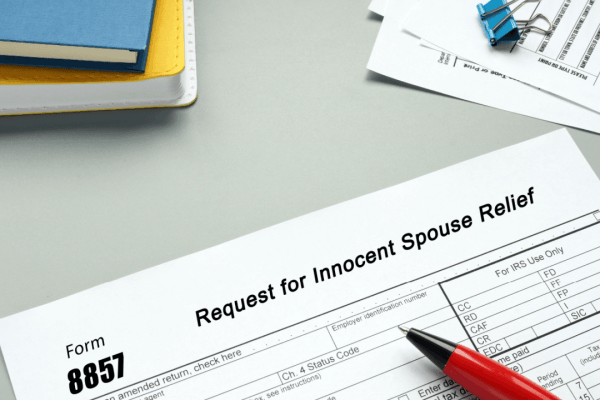 Form 8857 Request for Innocent Spouse Relief with pen showing what are the proofs of innocent spouse relief documentation