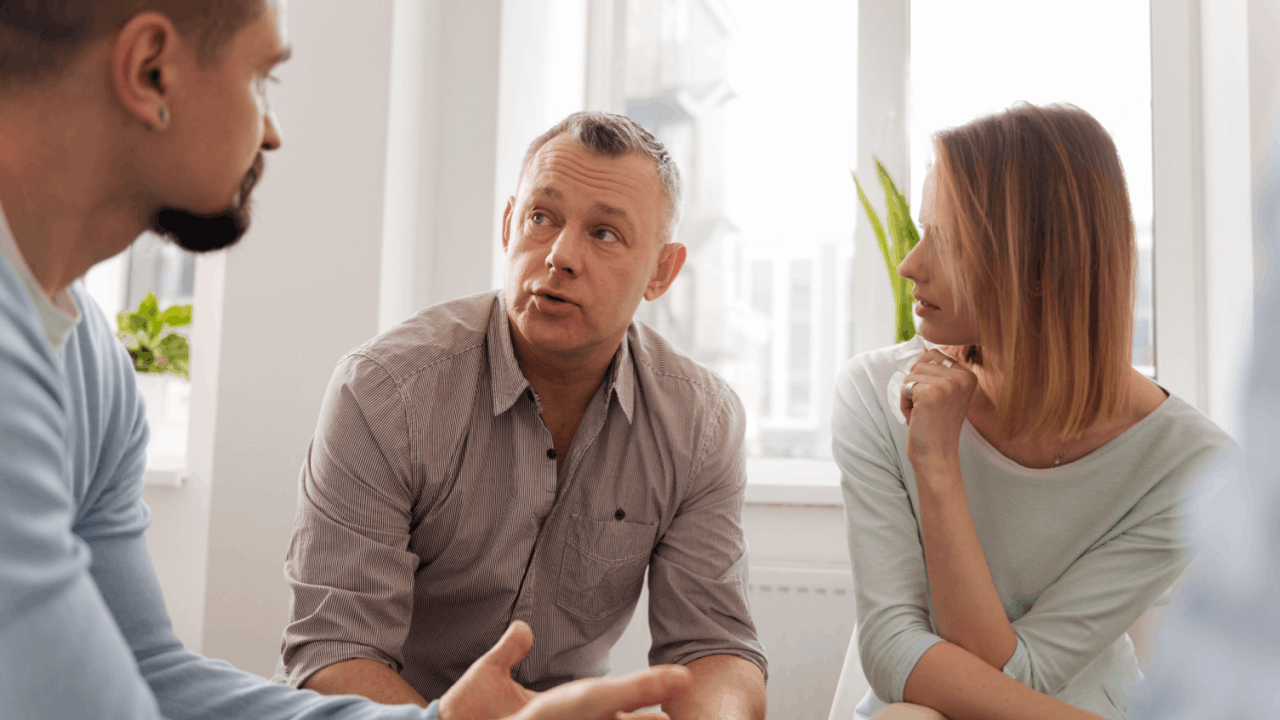 Couple consulting with tax professional about statute of limitations for innocent spouse relief and IRS tax debt options
