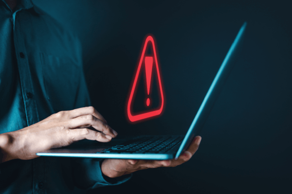 what throws red flags to the IRS warning sign on laptop screen