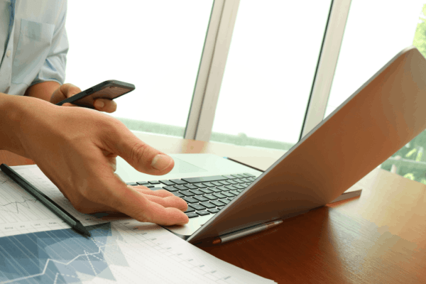 Future of bonus depreciation tax planning on laptop with financial charts