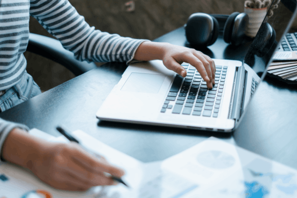 Is bonus depreciation going away — taxpayer reviewing IRS tax documents on laptop