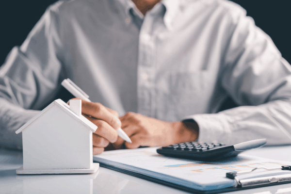 Used property bonus depreciation rules reviewed by tax professional with calculator and property model