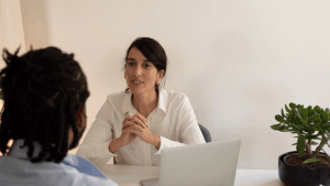 Tax advisor consulting with a client about obtaining an IRS wage garnishment release